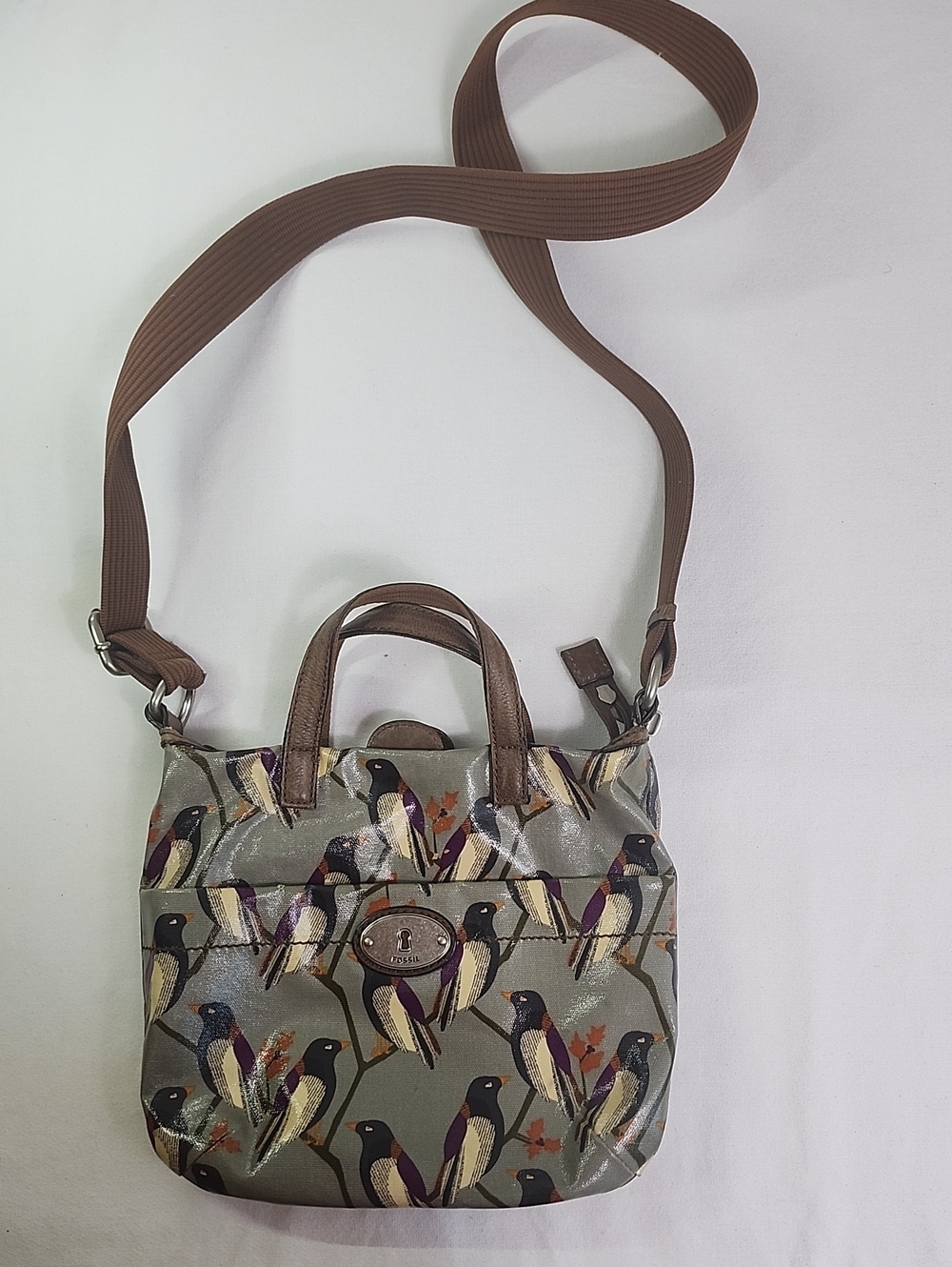 Fossil Gray Crossbody Bag with Brown Strap and Bird Print